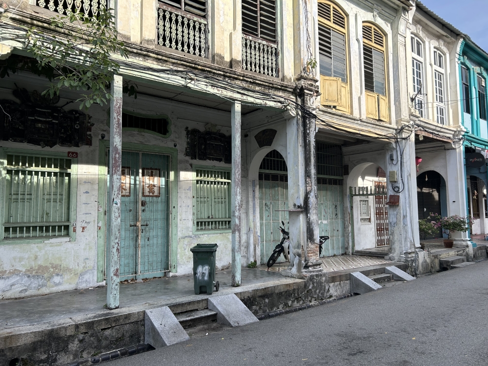 Prewar heritage shophouses along Love Lane. — Picture by Opalyn Mok