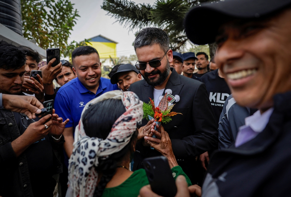 Balendra Shah, a rapper-turned-politician and the prime ministerial candidate for Rastriya Swatantra Party (RSP), interacts with locals ahead of Nepal’s general election, at a RSP office in Damak in Jhapa district, in Nepal, February 25, 2026. — Reuters pic 