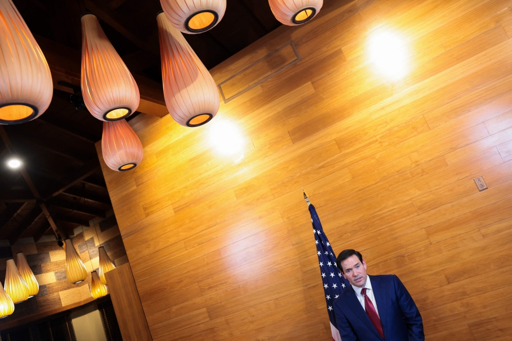 US Secretary of State Marco Rubio speaks to reporters in a departure lounge before returning to Washington following meetings with Caribbean Community (CARICOM) leaders, at Robert L. Bradshaw International Airport in Basseterre, Saint Kitts and Nevis on February 25, 2026. — Jonathan Ernst/Pool/AFP pic