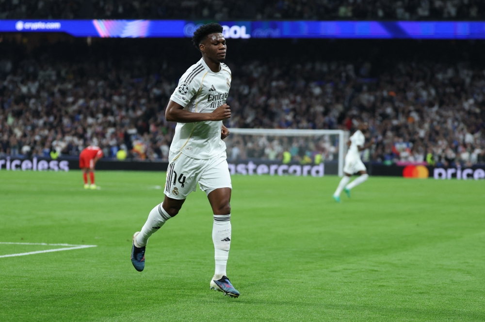 Real Madrid’s French midfielder #14 Aurelien Tchouameni celebrates scoring an equalizing goal during the Uefa Champions League knockout round play-off second leg football match between Real Madrid CF and SL Benfica at Santiago Bernabeu Stadium in Madrid on February 25, 2026. — AFP pic 