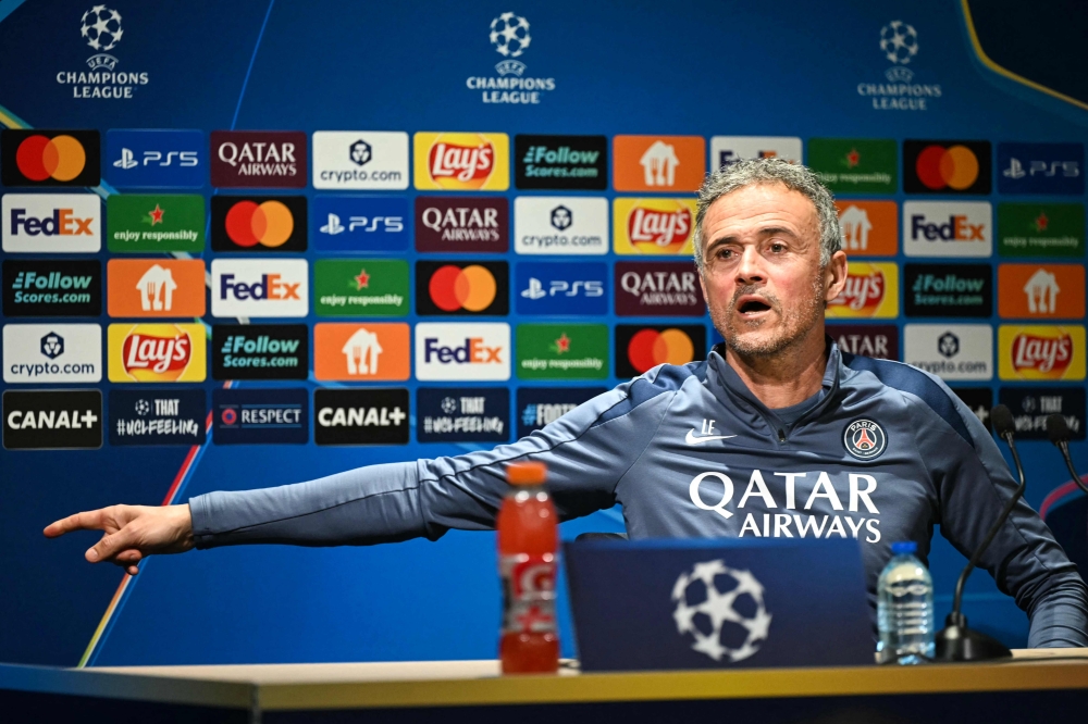 Paris Saint-Germain’s Spanish head coach Luis Enrique gestures as he speaks during a press conference at the Campus Paris Saint-Germain in Poissy, in the western outskirts of Paris on February 24, 2026, on the eve of the Uefa Champions League play-off second leg football match between Paris Saint-Germain and AS Monaco. — AFP pic 