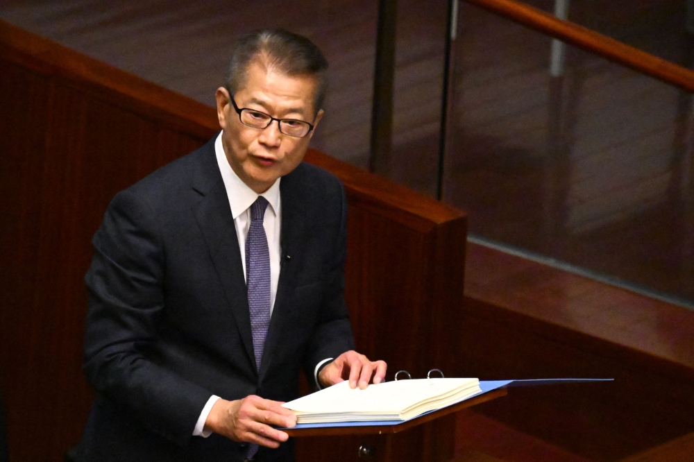 Hong Kong Financial Secretary Paul Chan delivers his annual budget address in the Legislative Council chamber in Hong Kong on February 25, 2026. — AFP pic 