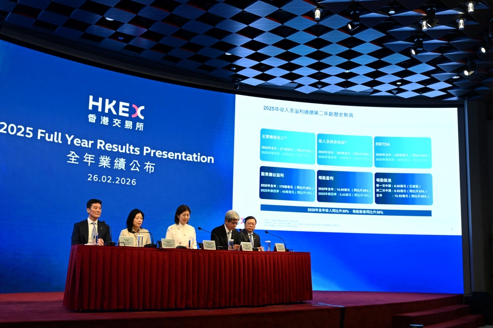 Hong Kong Exchanges and Clearing (HKEx) Chief Executive Officer Bonnie Chan (centre), flanked by (from left) Head of Markets Gregory Yu, Chief Operating Officer Vanessa Lau, Group Chief Financial Officer Herbert Hui, and Group Trade Information Officer Richard Leung, attend the 2025 Full Year Results Presentation in Hong Kong on February 26, 2026. — AFP pic 
