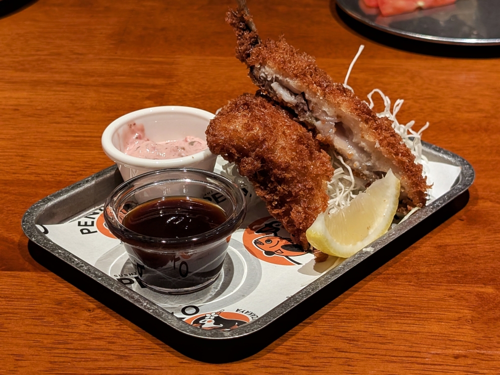 Fried ‘izakaya’ fare, like the Aji Katsu Fry, breaded and fried horse mackerel, is also a highlight. — Picture by Ethan Lau