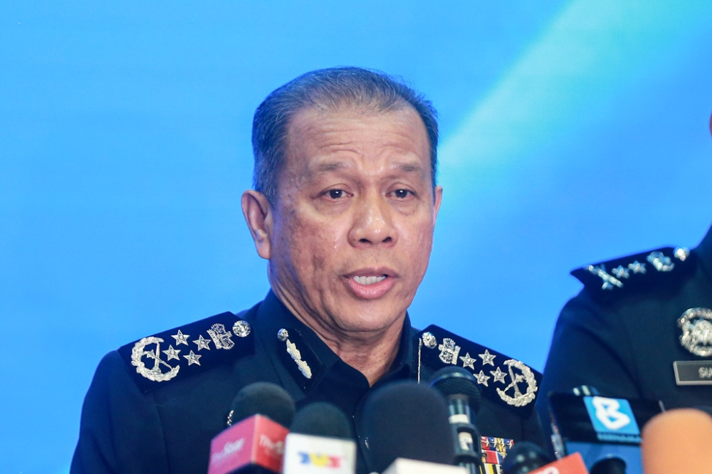Inspector-General of Police Datuk Seri Mohd Khalid Ismail speaks to the press during a press conference regarding a recent police operation at Bukit Aman in Kuala Lumpur on February 27, 2026. — Picture by Sayuti Zainudin