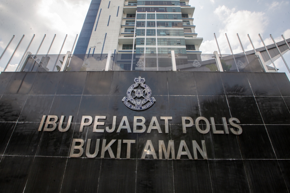 A general view shows the Royal Malaysia Police (PDRM) logo displayed at the main entrance to its Bukit Aman headquarters in Kuala Lumpur on April 29, 2025. — Picture by Raymond Manuel