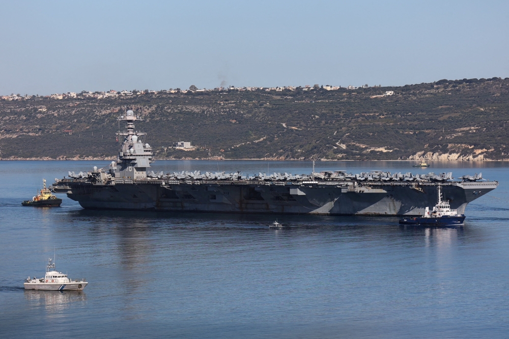 USS Gerald R. Ford aircraft carrier leaves Souda Bay on the island of Crete, Greece February 26, 2026. Several countries have begun withdrawing dependents of diplomatic personnel and non-essential staff from some locations in the Middle East, or advising citizens to defer travel to Iran, amid rising tensions between Washington and Tehran. — Reuters pic 