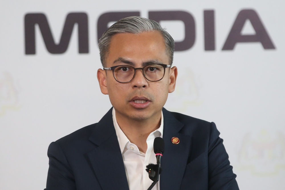Communications Minister Datuk Fahmi Fadzil speaks during a press conference in Putrajaya on February 27, 2026. — Picture by Yusof Isa