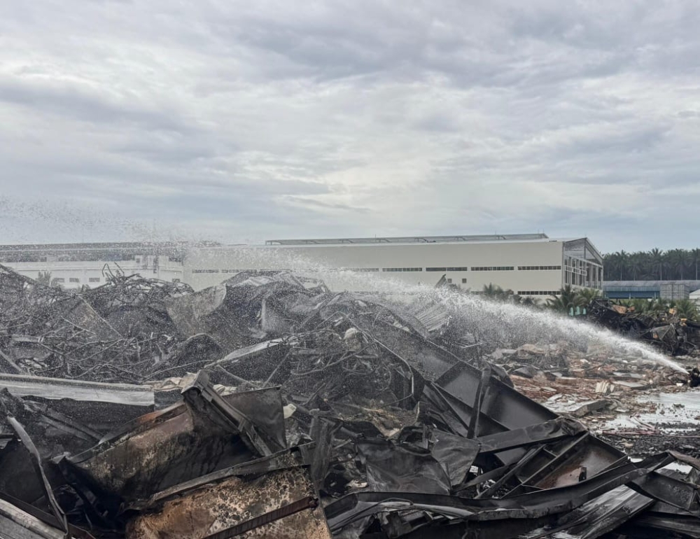 The aftermath of the gutted rubber and plastic warehouse in the Sengkang Industrial Area in Senai near Kulai on February 27, 2026. — Picture courtesy of the Johor Fire and Rescue Department