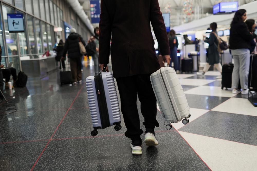 Passengers would be limited to two power banks per person and asked not to use them during flights under proposed stricter rules aimed at preventing fires following a series of incidents, Kyodo News Agency reported, citing Japan’s transport ministry today. — Reuters pic