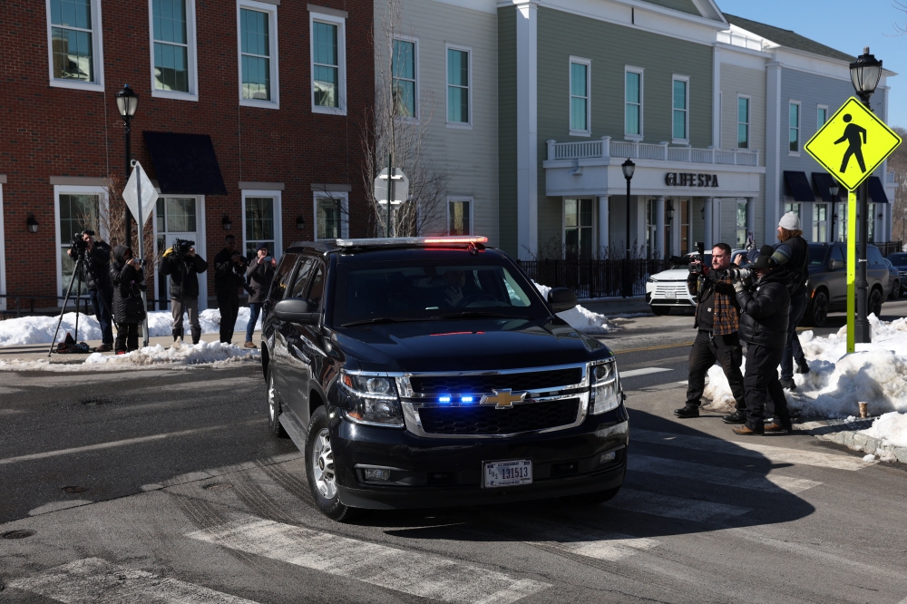 A vehicle of a motorcade believed to be carrying former US President Bill Clinton arrives at the Chappaqua Performing Arts Centre, on the day he appears for a deposition in the House Oversight Committee investigation of late financier and convicted sex offender Jeffrey Epstein, in Chappaqua, New York February 27, 2026.   — Reuters pic