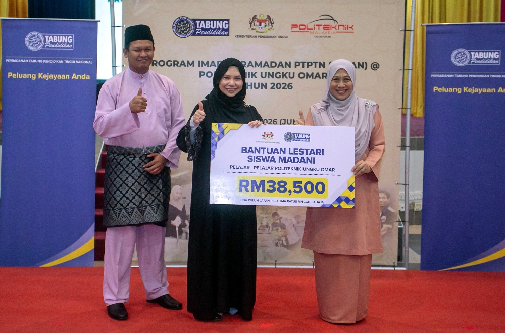 PTPTN chairman Datuk Seri Norliza Abdul Rahim (second left) said the government allocates RM3 billion annually to support 600,000 existing and new students. — Bernama pic