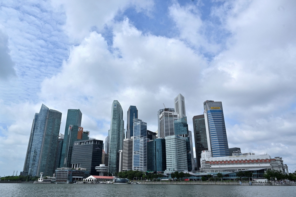 Singapore has granted permanent residency (PR) status to 450 individuals through the Global Investor Programme from 2015 until 2025, said Trade and Industry Minister Gan Siow Huang. — Reuters pic