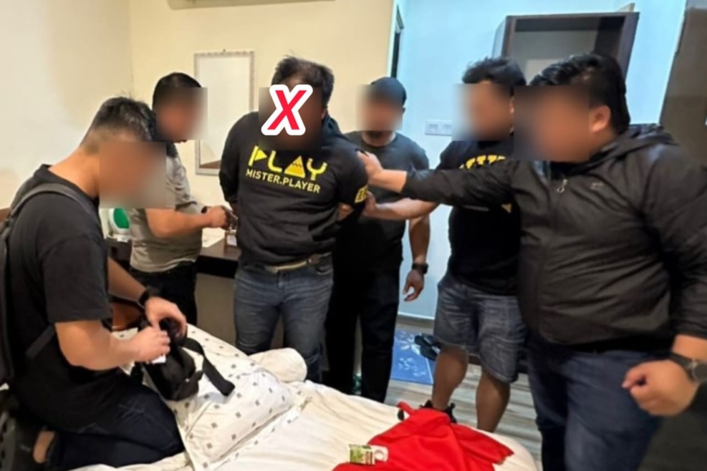 Police also seized several items believed to have been used during the robbery, including a helmet, clothing, a knife and a motorcycle. — Daily Express pic