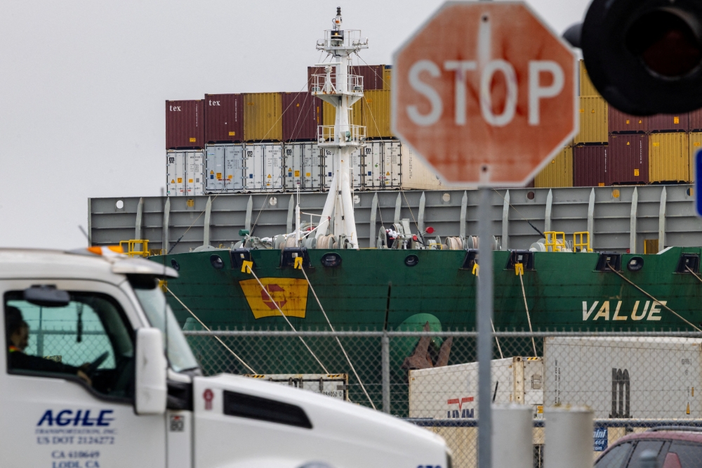 US President Donald Trump’s administration is seeking to delay legal proceedings linked to tariff refunds for importers, a court filing showed yesterday, a week after the Supreme Court struck down his global duties. — Reuters pic  