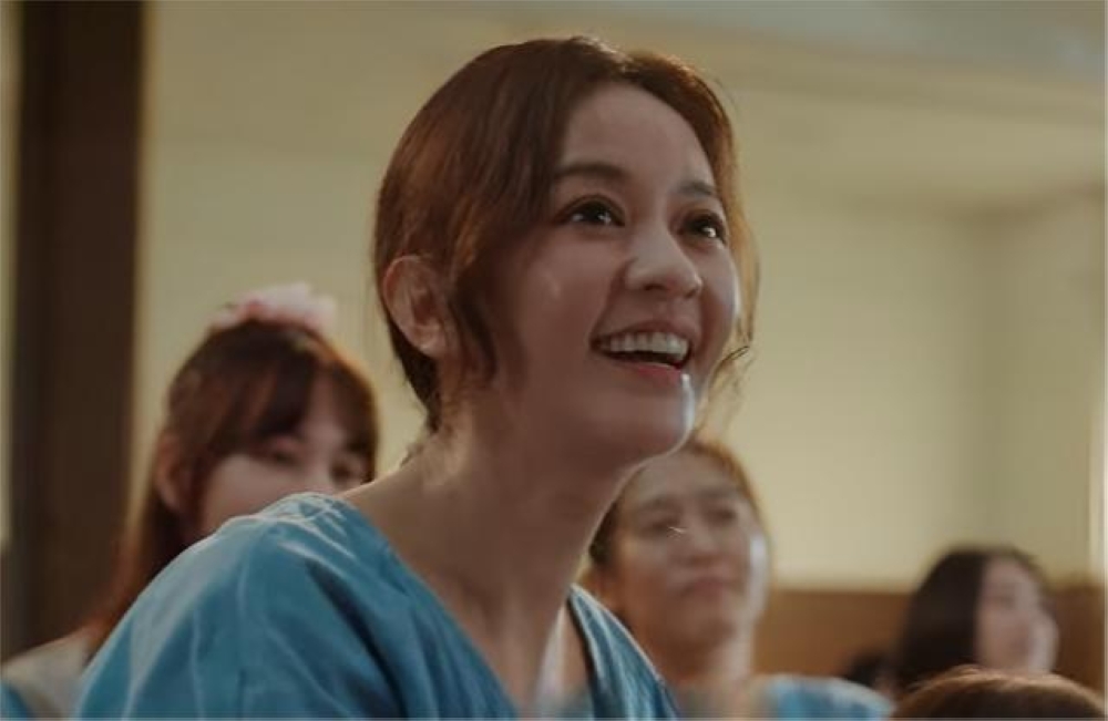 Ivy Chen plays the lead character Li Hui-zhen in ‘Sunshine Women’s Choir.’ — Screengrab via YouTube/SGCloverFilms