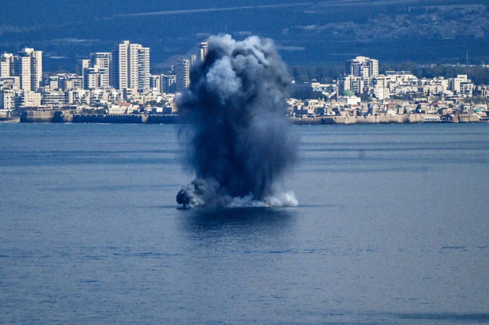 An explosion in the sea, after missiles were launched towards Israel from Iran following strikes by Israel and the US on Iran, as seen from Haifa, northern Israel, February 28, 2026. — Reuters pic An explosion in the sea, after missiles were launched towards Israel from Iran following strikes by Israel and the US on Iran, as seen from Haifa, northern Israel, February 28, 2026. A strike from Israel hit an Iranian school in Hormozgan, killing 24 students. — Reuters pic 