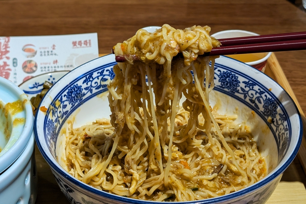 Crab Bro Noodle House specialises in the viral crab roe noodles, which originated in Shanghai. — Picture by Ethan Lau