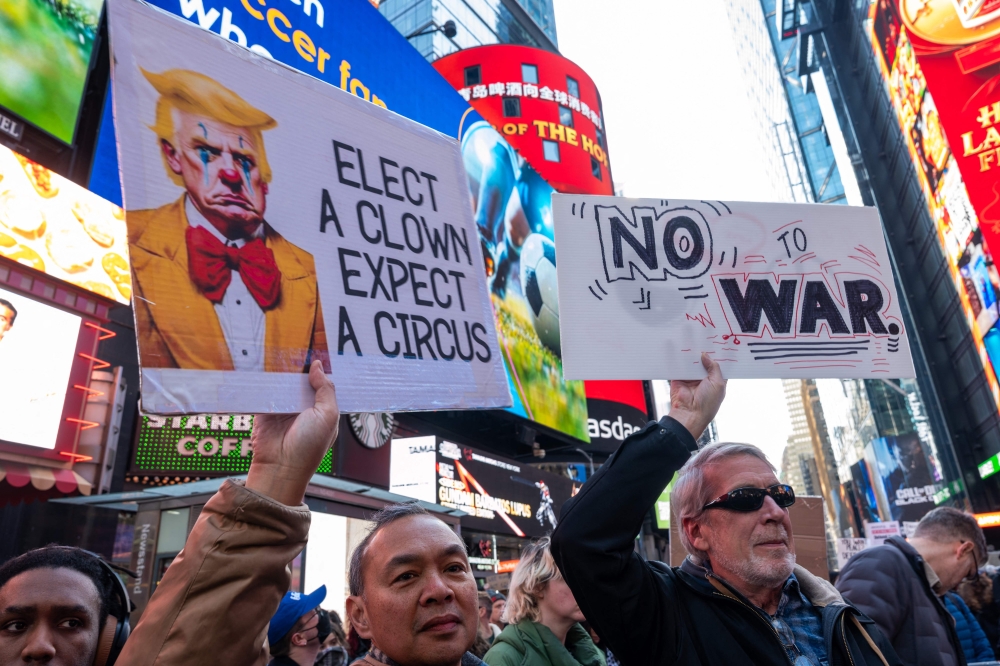 People gather in Times Square as the nation reacts to “major combat operations” in Iran on February 28, 2026 in New York City. — AFP pic