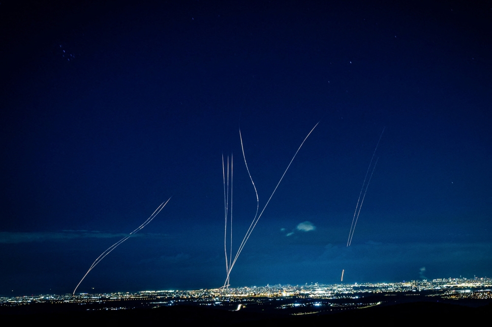 Interceptions attempt after Iran launched missiles into Israel, following Israeli and US strikes on Iran, in central Israel February 28, 2026. — Reuters pic