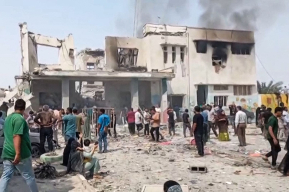 This image grab taken from Iranian state television broadcasted on February 28, 2026, show what it says is the site of deadly US and Israeli strikes that hit a girls' elementary school in Minab, in the southern Iranian province of Hormozgan near the strategic sea route of the Strait of Hormuz. — IRIB TV/AFP pic