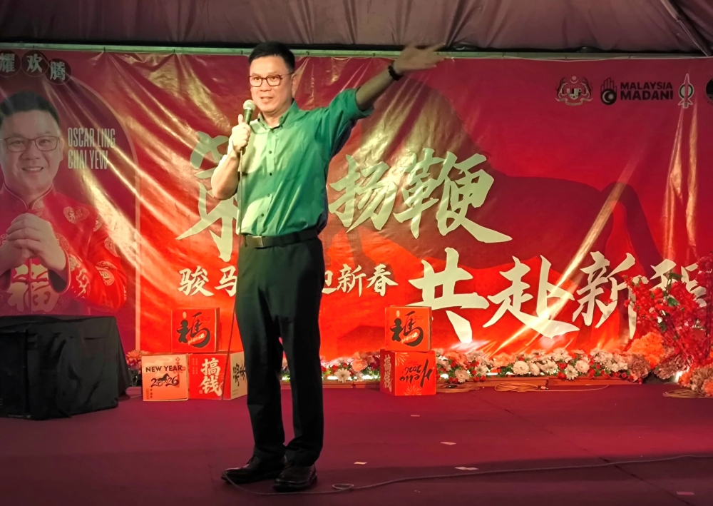 Sarawak DAP vice-chairman Oscar Ling speaks during the Lunar New Year celebration at Rejang Park commercial centre in Sibu on February 28, 2026. — The Borneo Post pic