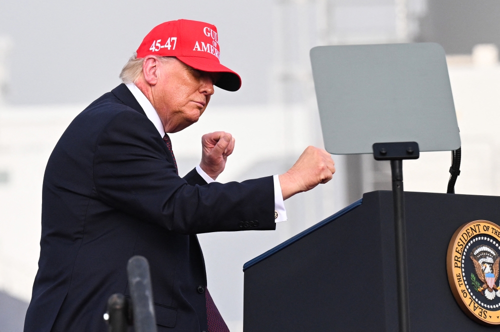 President Donald Trump said Sunday the United States would hit Iran with ‘force that has never been seen before’ if the country retaliated against US and Israeli strikes that killed supreme leader Ayatollah Ali Khamenei. — AFP pic