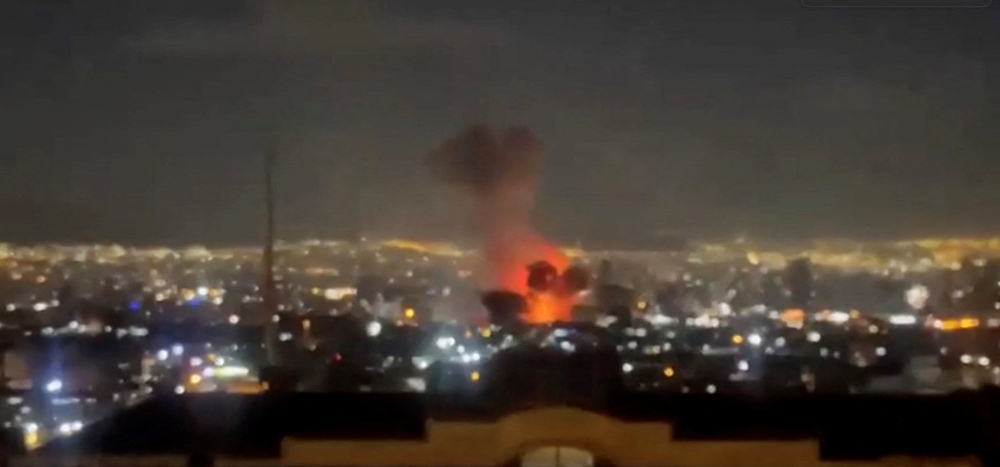 Fireball after reported strikes near the Islamic Republic of Iran Broadcasting headquarters in Tehran, Iran March 1, 2026 in this still image obtained from a social media video. — Social media pic via Reuters 