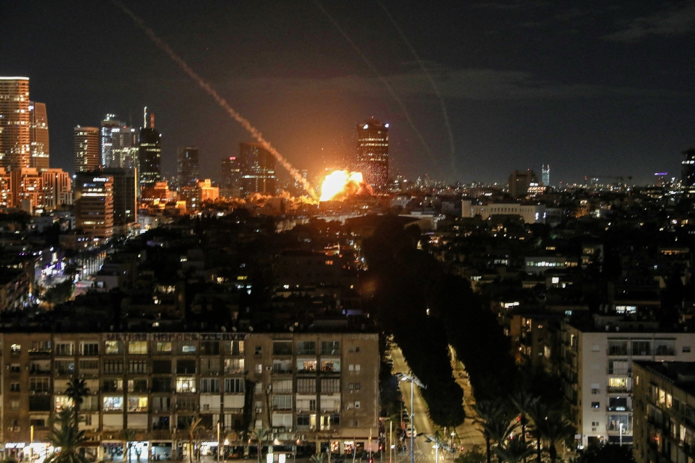 An explosion caused by a projectile impact after Iran launched missiles into Israel following Israel and the US launched strikes on Iran, in Tel Aviv February 28, 2026. — Reuters pic