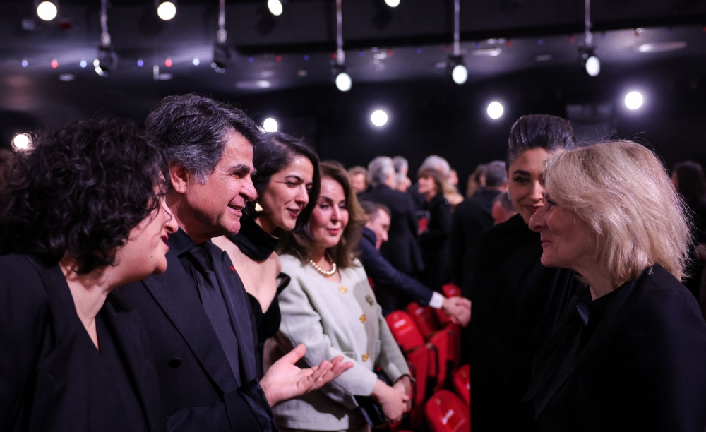 (Second from left) Translator, Iranian director and screenwriter and producer Jafar Panahi, French-Iranian actress Golshifteh Farahani listens to France's newly appointed minister of Culture Catherine Pegard (right) ahead of the 51st edition of the Cesar Film Awards ceremony at the Olympia venue in Paris on February 26, 2026. — AFP pic