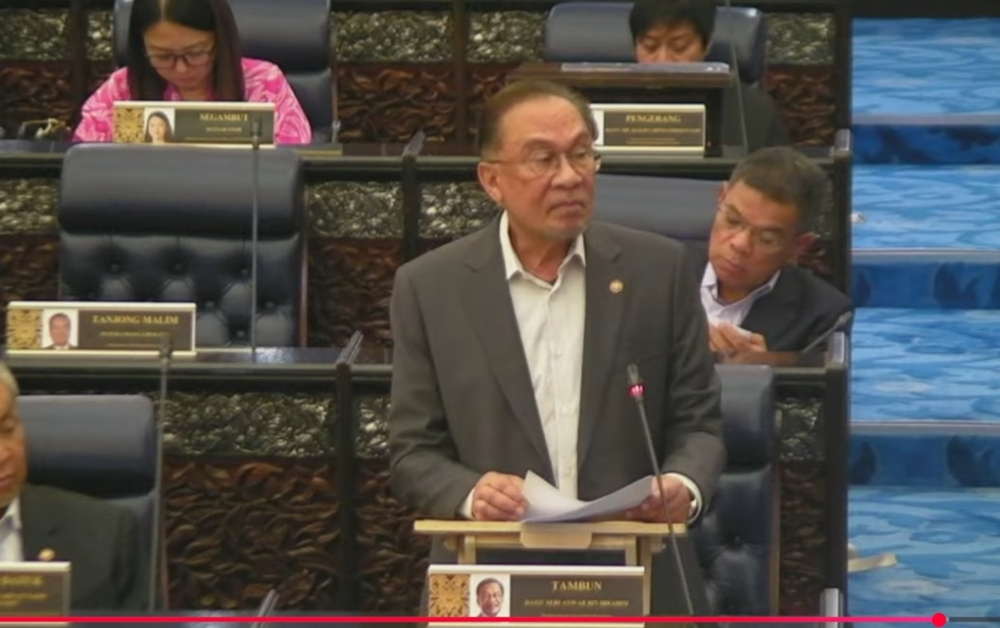Prime Minister Datuk Seri Anwar Ibrahim used this morning’s parliamentary session to denounce the United States and Israel’s military strikes on Iran, calling them a blatant breach of international law and reiterating his demand for an immediate ceasefire. — Screengrab from YouTube/Parlimen Malaysia
