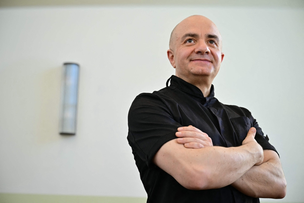 Imad Alarnab, a chef and restaurant owner who fled Syria in 2015, poses during an interview with AFP at one of his restaurants in central London on February 4, 2026. — AFP pic