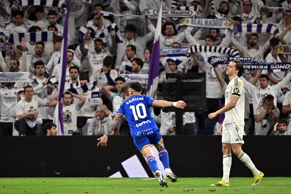Getafe’s Martin Satriano celebrates scoring the opening goal during the La Liga match with Real Madrid at Santiago Bernabeu Stadium in Madrid March 2, 2026. — AFP pic