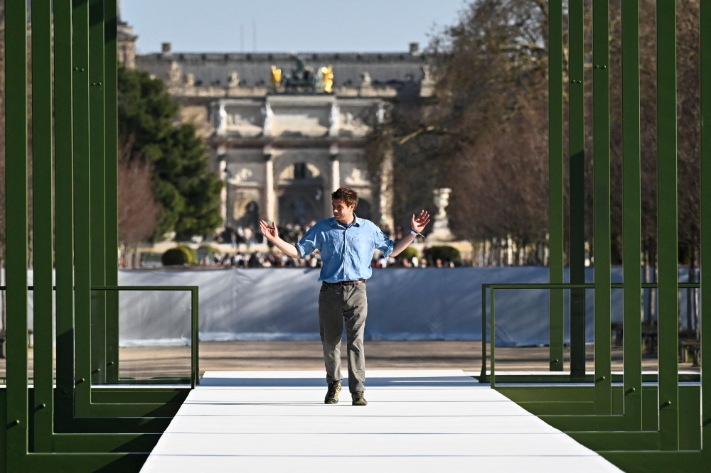 British fashion designer Jonathan Anderson acknowledges the audience at the end of the Christian Dior Women’s Ready to Wear Fall/Winter 2026-2027 collection fashion show as part of the Paris Women Fashion Week, in Paris March 3, 2026. — AFP pic