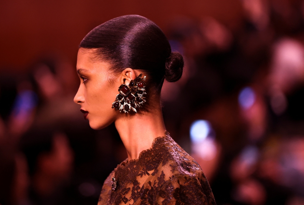 A model presents a creation by designer Anthony Vaccarello as part of his Fall/Winter 2026/2027 Women’s ready-to-wear collection show for fashion house Saint Laurent during Paris Fashion Week in Paris March 3, 2026. — Reuters pic