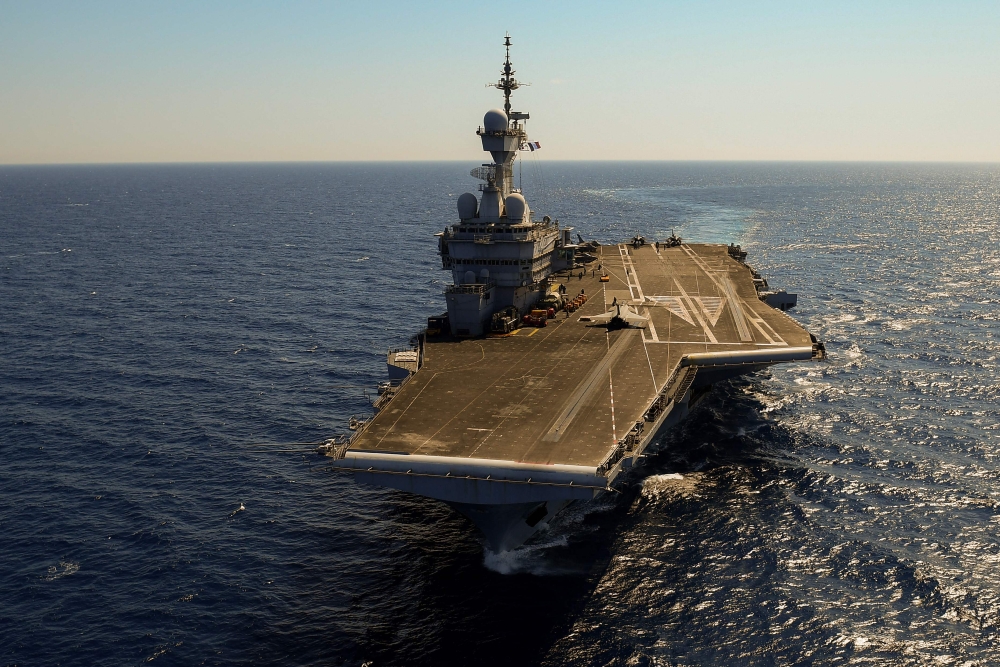 An aerial photograph shows the French aircraft carrier Charles-de-Gaulle off the coast of Toulon, southern France on June 5, 2021. Emmanuel Macron announced on March 3, 2026 additional military reinforcements to the war-torn Middle East, including the aircraft carrier Charles de Gaulle and its escort of frigates, which will ‘set course’ for the Mediterranean. — AFP pic 
