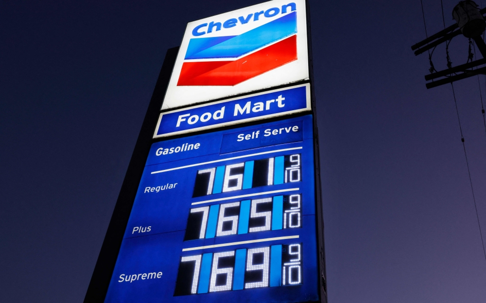 High gas prices are displayed at a downtown Chevron station on March 3, 2026 in Los Angeles, California. The average price of one gallon of regular self-service gasoline rose to US$4.72 today in Los Angeles County amid widening war in the Middle East, March 3, 2026. — Getty Images pic via AFP 