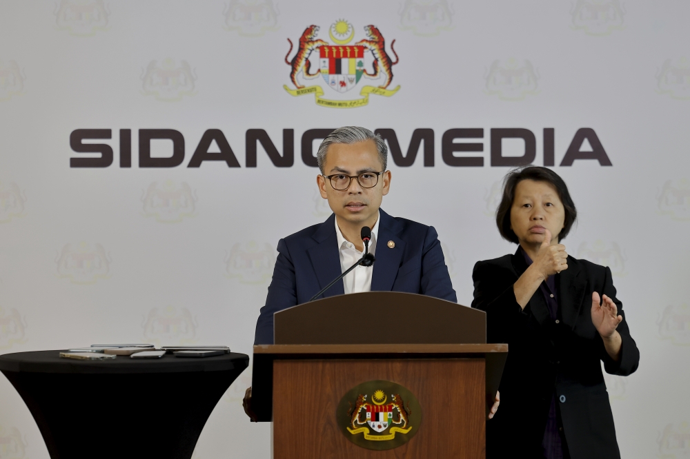 Communications Minister Datuk Fahmi Fadzil speaks during the ministry’s weekly press conference at the Communications Ministry in Putrajaya, March 4, 2026.