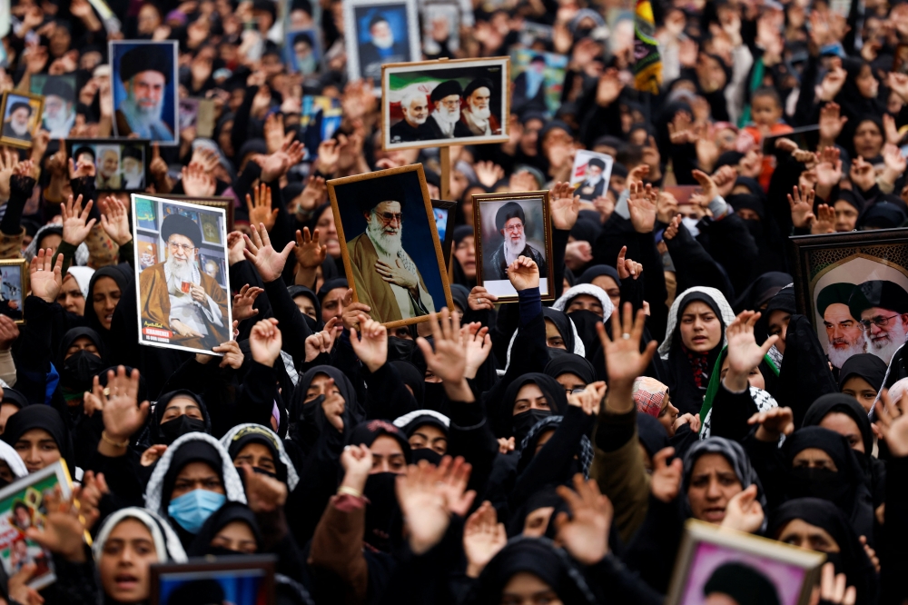 Shi’ite Muslim women chant anti-US and anti-Israel slogans as they gather for a demonstration following the killing of Iran’s Supreme Leader Ayatollah Ali Khamenei in US and Israeli strikes on Saturday, in Magam town, Indian Kashmir, March 4, 2026. — Reuters pic 