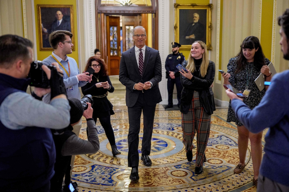 Senate Majority Leader John Thune (R-SD) speaks to reporters after voting at the US Capitol on March 4, 2026 in Washington, DC. Senate Republicans voted down a Democratic-backed war powers resolution that would have prevented President Donald Trump from continuing the military campaign against Iran. — Getty Images pic via AFP 