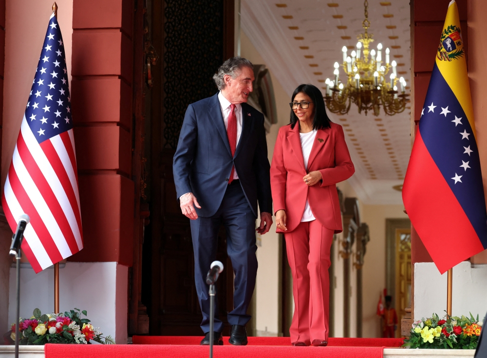 Venezuela’s interim President Delcy Rodriguez and US Interior Secretary Doug Burgum walk together to deliver a statement, in Caracas, Venezuela, March 4, 2026. — Reuters pic 