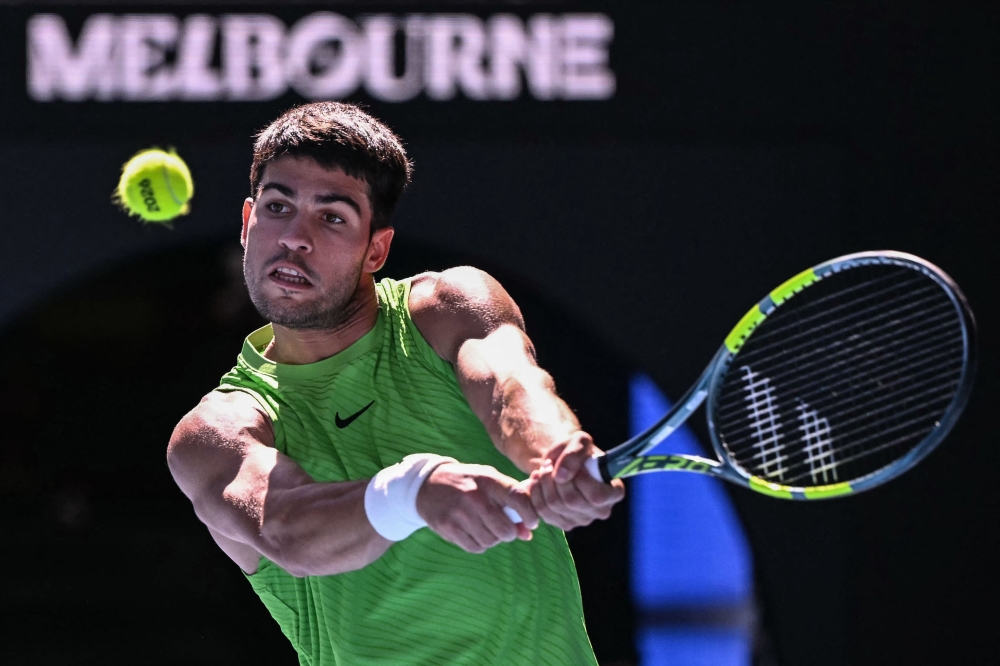 Spain’s Carlos Alcaraz, 22, made history last month when he lifted the Australian Open title to become the youngest man to complete a career Grand Slam. — AFP pic