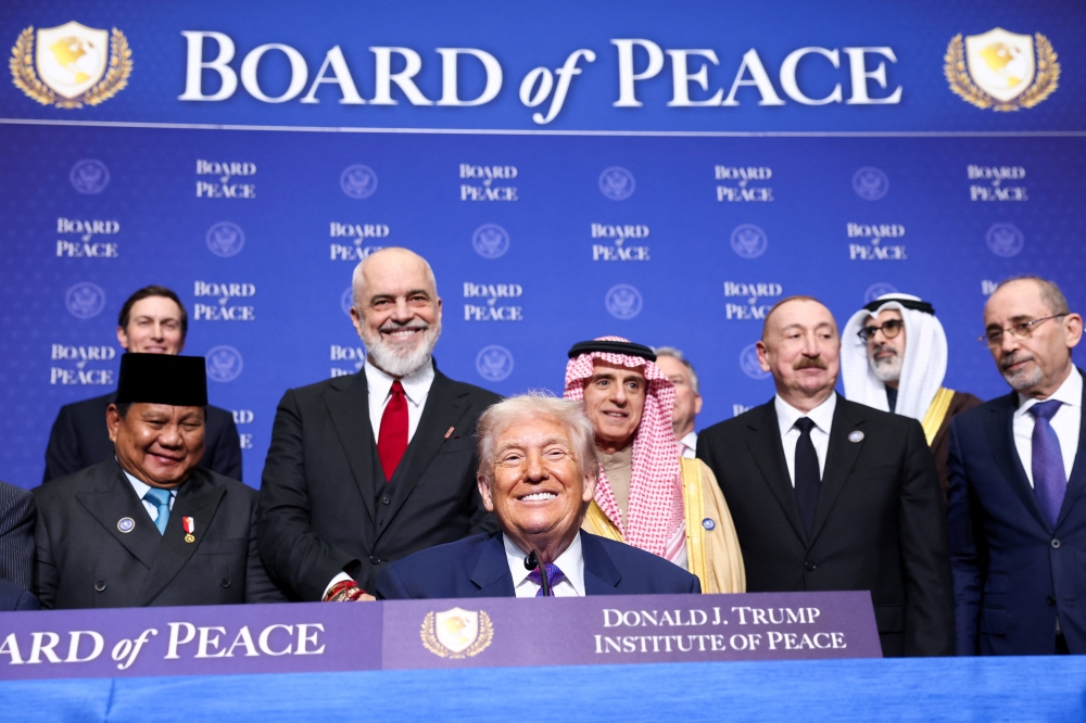 US President Donald Trump, Indonesia’s President Prabowo Subianto, Albania’s Prime Minister Edi Rama, Saudi Minister of State for Foreign Affairs, Cabinet Member, and Climate Envoy Adel Al-Jubeir, Azerbaijani President Ilham Aliyev, and Jordan’s Foreign Minister Ayman Safadi attend the inaugural Board of Peace meeting at the US Institute of Peace in Washington, DC, February 19, 2026. — Reuters pic