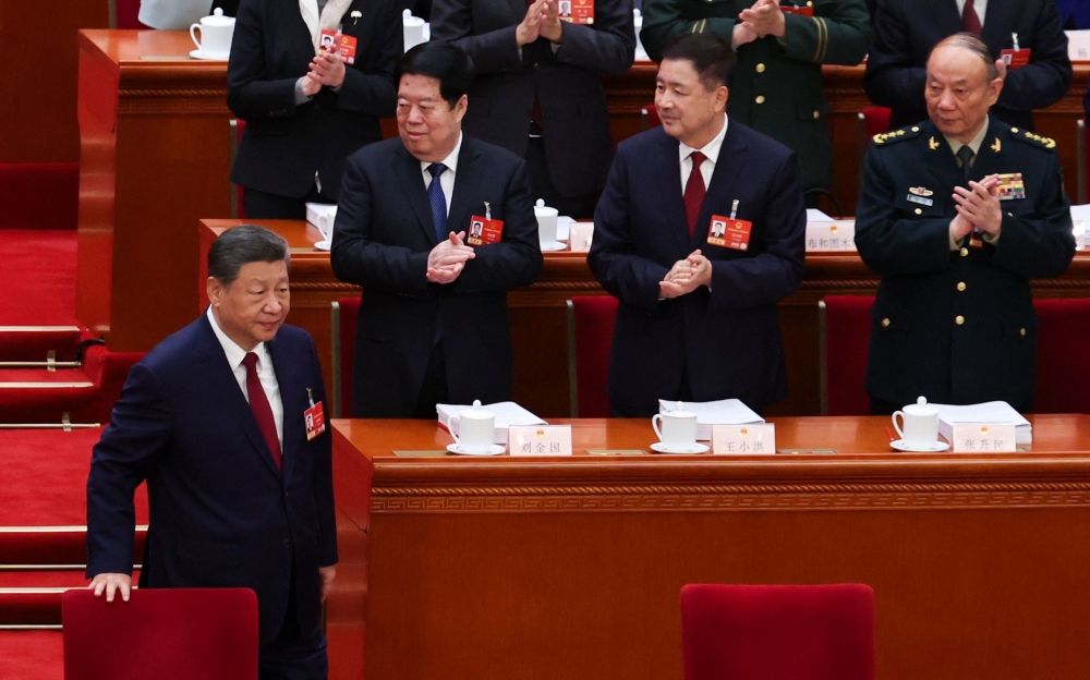 Chinese President Xi Jinping attends the opening session of the National People’s Congress (NPC) at the Great Hall of the People in Beijing on March 5, 2026. — AFP pic 