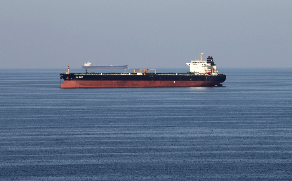 File picture of an oil tanker passing through the Strait of Hormuz, December 21, 2018. China has told its largest oil refiners to suspend exports of diesel and gasoline, Bloomberg News reported Thursday, as the war in the Middle East increasingly risks an energy supply crunch. — Reuters pic 
