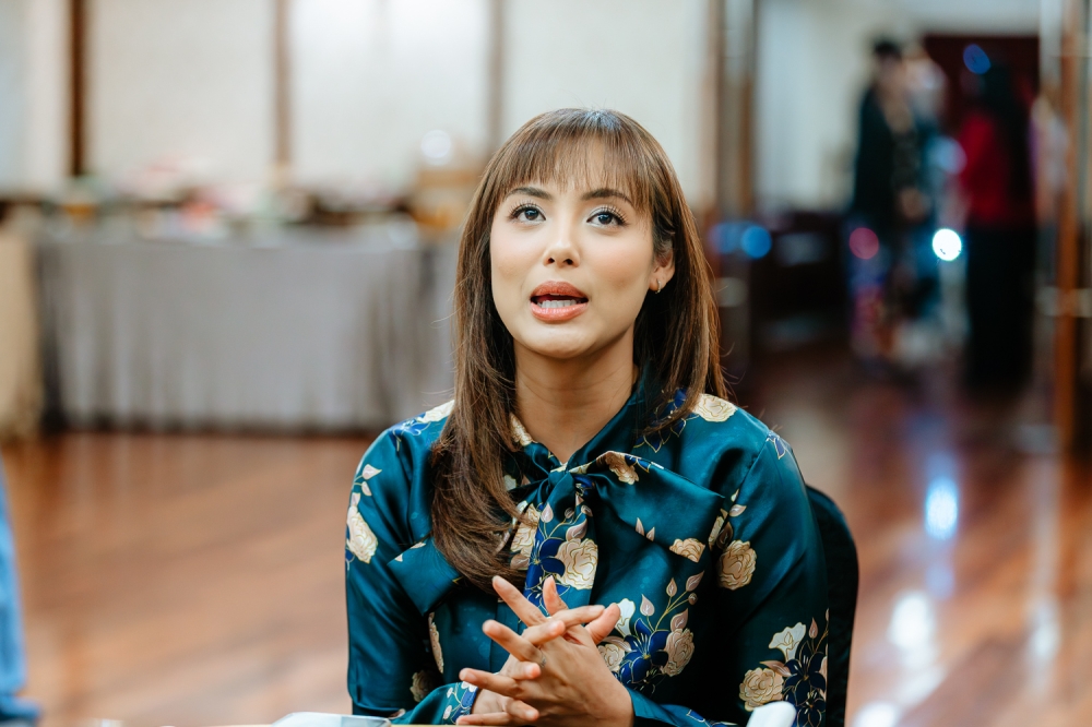 Ezzanie Jasny speaks to the media during an interview session at the LOL Entertainment Raya advertisement launch and buka puasa event in Kuala Lumpur on March 4, 2026. — Picture by Raymond Manuel