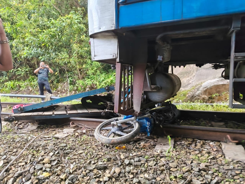 Villagers threw a motorcycle onto the tracks to stop a runaway train along the Tenom-Pangi route in Sabah on March 3, 2026. — Picture from Facebook/Jamawi Jaafar