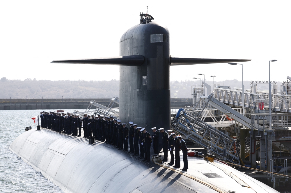 Members of the French Navy are aboard a submarine awaiting the arrival of French President Emmanuel Macron at the nuclear submarine navy base of Ile Longue in Crozon, France, March 2, 2026. — Yoan Valat/Pool/Reuters pic 