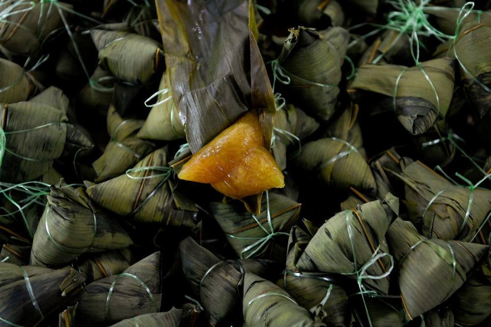 According to Sarah, bamboo leaf ketupat, also known as elephant ketupat, gives off a unique fragrance, distinguishing it from the ketupat palas or rice ketupat that are commonly found in the market. — Bernama pic