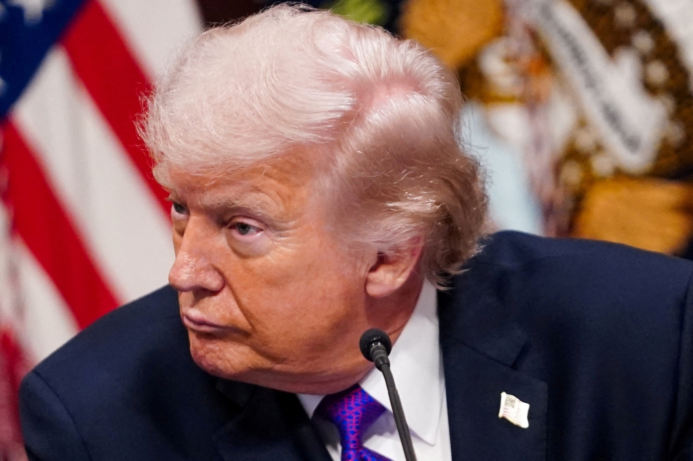 The documents released Thursday include descriptions of multiple 2019 interviews the FBI held with the woman, who alleged she was assaulted by both Epstein and Donald Trump while she was between 13 and 15 years old. — Reuters pic 